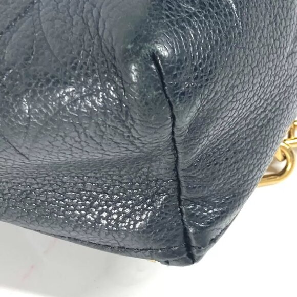 LOUIS VUITTON M80596 MonogramEmpreinte Tiny Backpack Bag main image 13